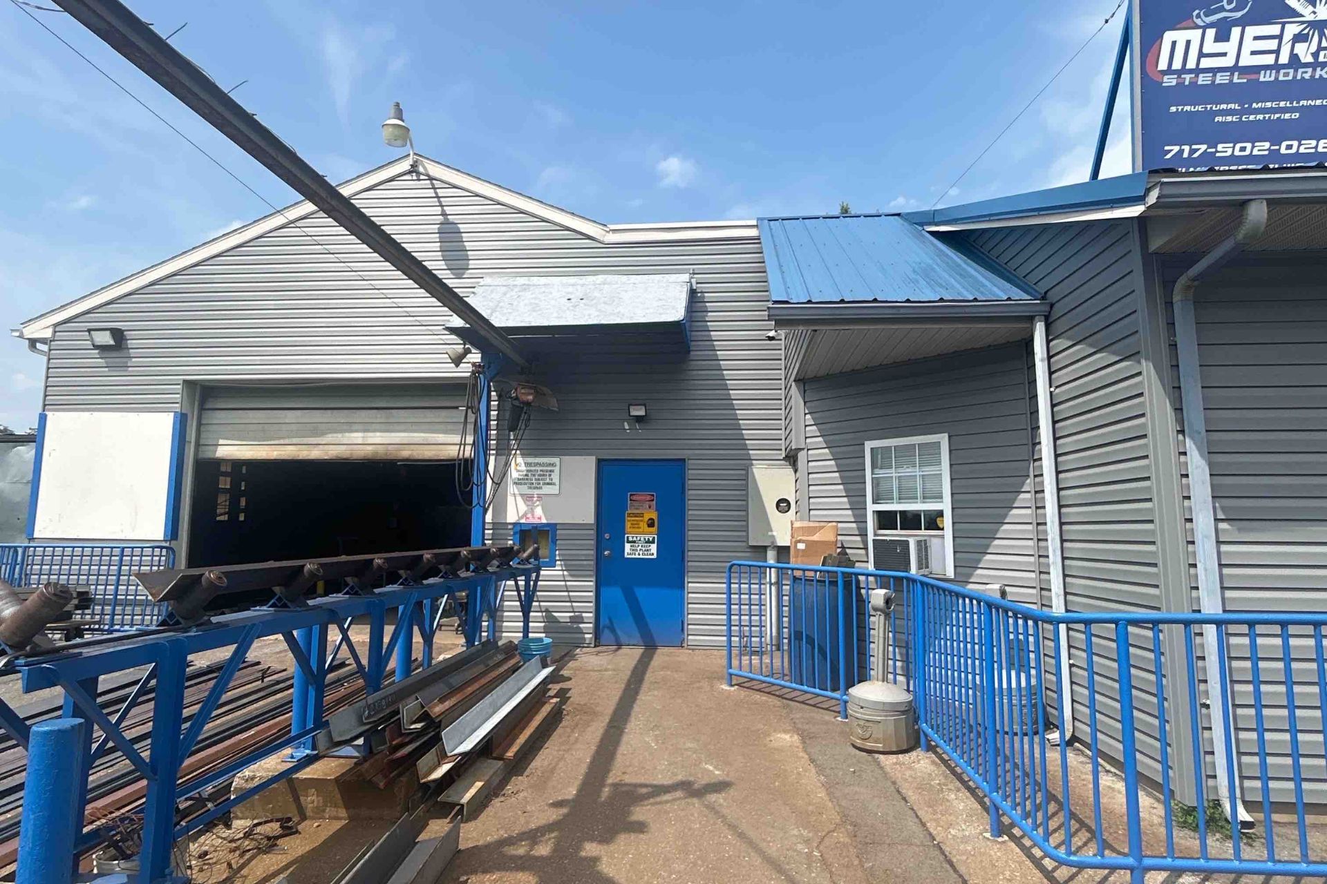 Roof repairs being performed on a church in Mechanicsburg, PA. The technician is using a lift to access the affect area of the roof.