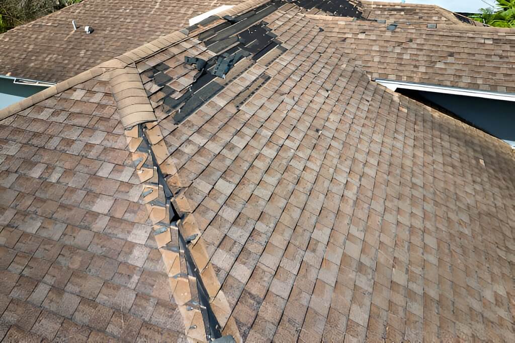 Wind Damaged House Roof